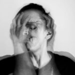 person experiencing muscle pain