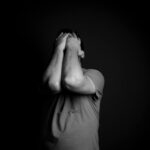 person struggling with documents